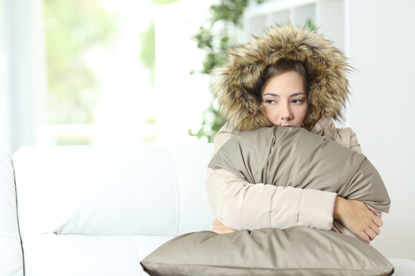 image of woman with broken furnace