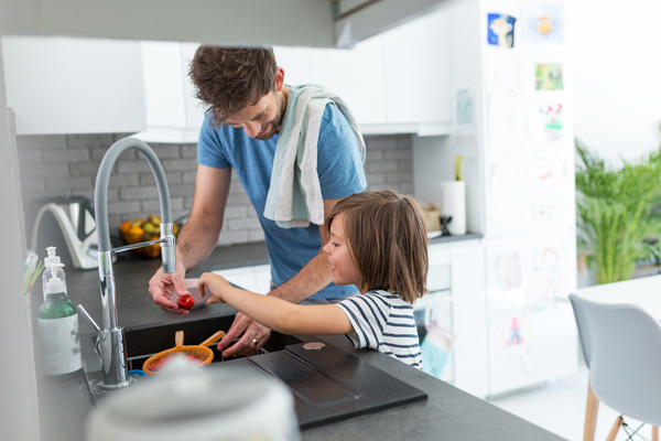 family enjoying cool air at home during summer