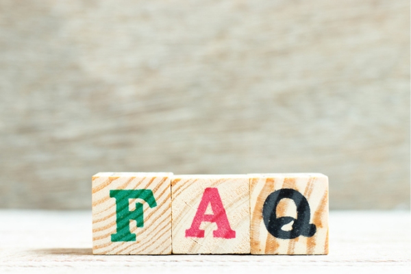 FAQ spelled using wooden letter cubes depicting questions about how do ductless air conditioners work
