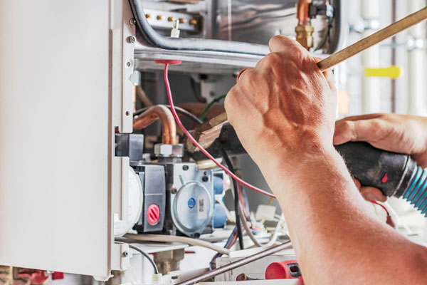 HVAC Tech Troubleshooting A Gas Furnace