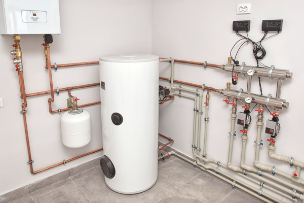 image of an oil-fired water heater and boiler room