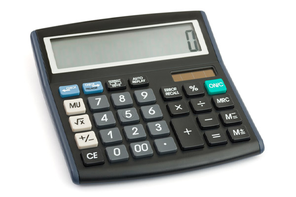image of hands and calculator calculating ac seer efficiency rating