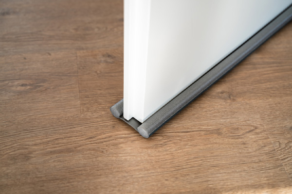 image of a door draft stopper for home heating efficiency