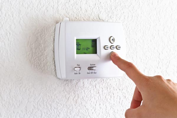 adjusting programmable thermostat