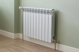 heating hot water radiator installed in the house