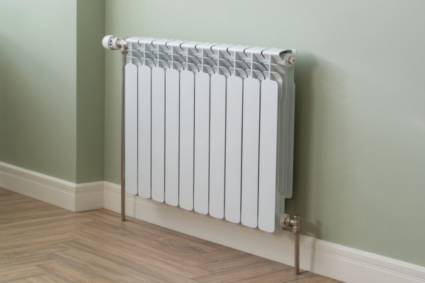 heating hot water radiator installed in the house