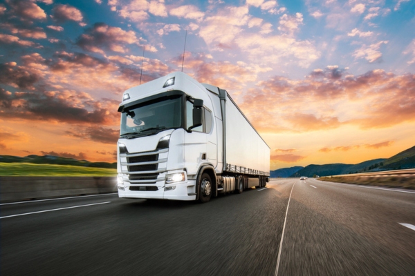 truck with container on the road fueled by diesel