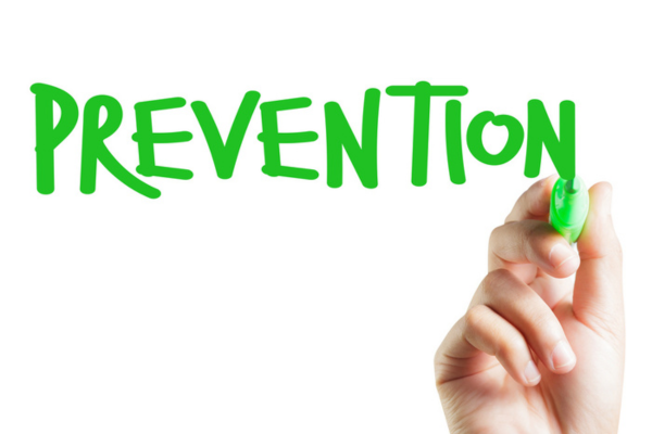 PREVENTION written on a virtual board using green marker